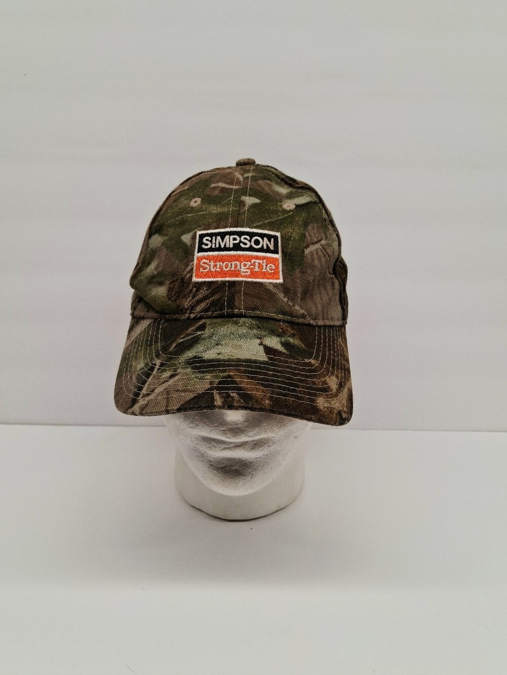 Daystone Simpson Strong-Tie Real Tree Camo Adjustable Embroidered Logo Hat